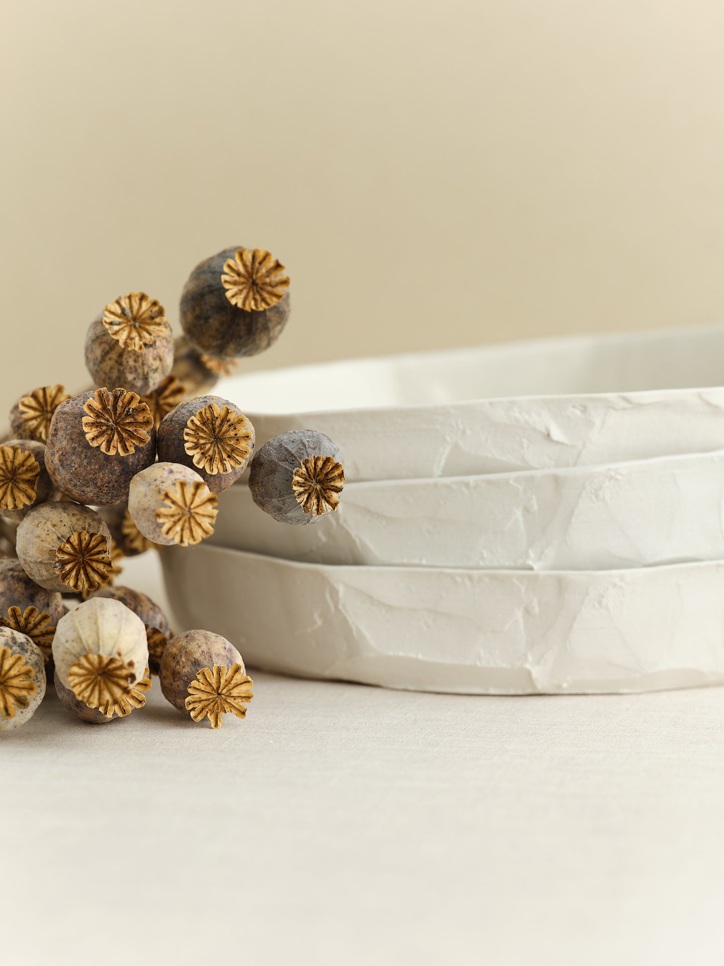 high-walled medium sized porcelain plate is handmade in Zurich