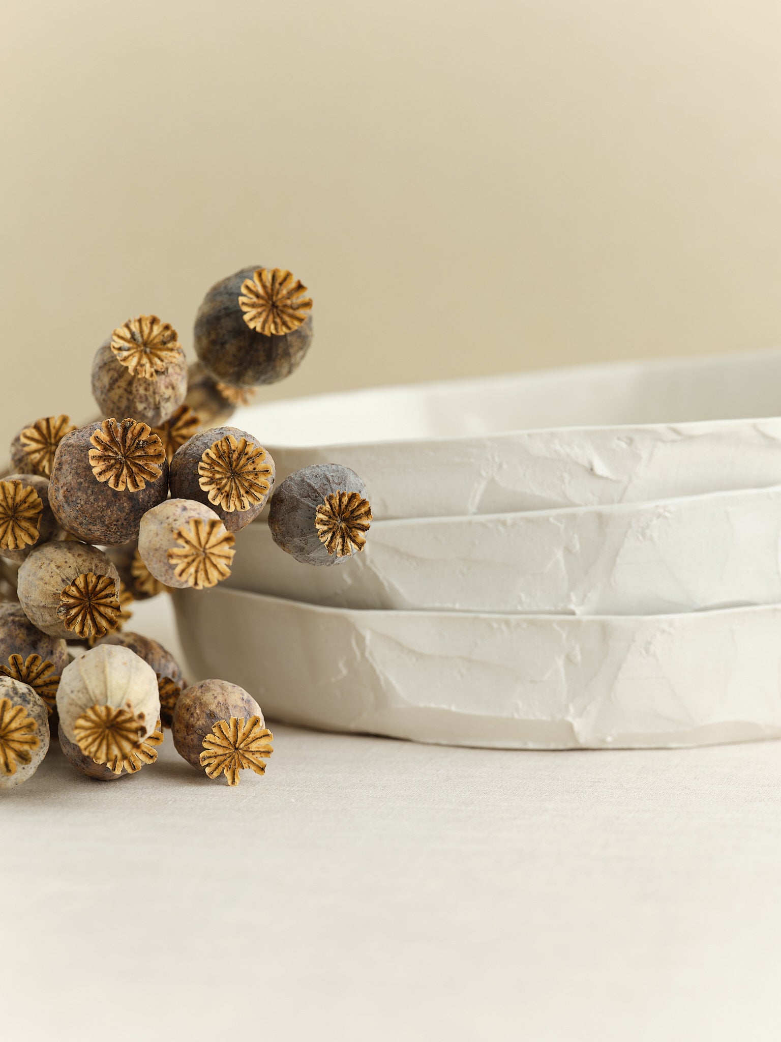 high-walled medium sized porcelain plate is handmade in Zurich